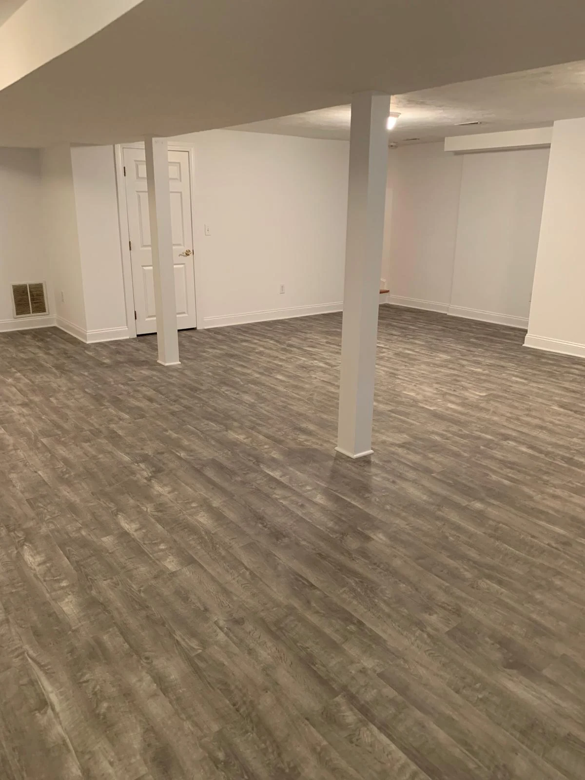 Finished basement living space photo 1 by Craftsman Home Improvement Inc.
