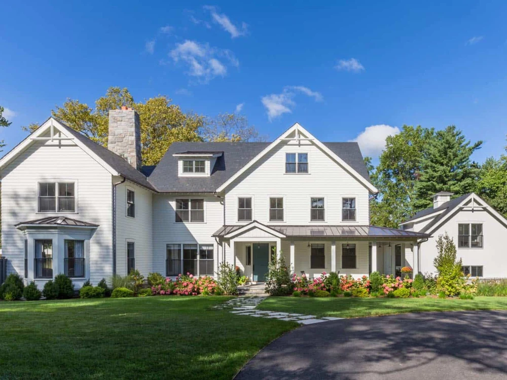 Renovated home exterior by Craftsman Home Improvement Inc.